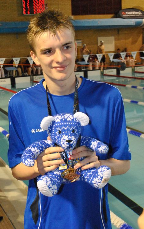Felix Gifford with his bronze medal.