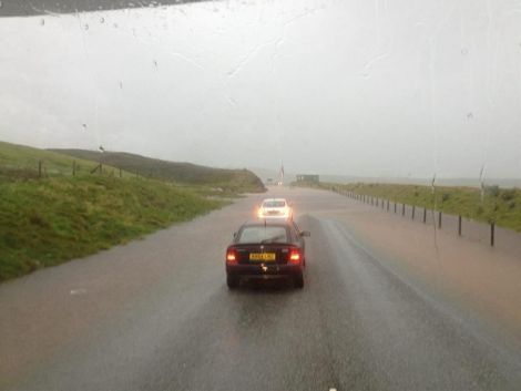 Police closed the road at Brindister after heavy flooding caused a landslide. This picture was taken from a car that was stopped by the police from going any further.