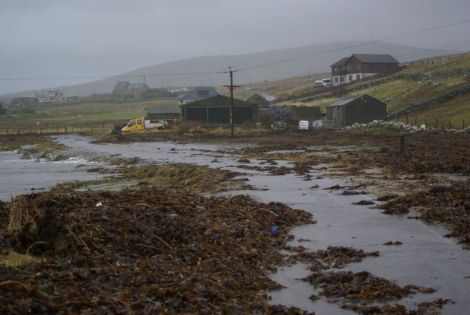 Seaweed and shingle blocked the road at Boddam. Pic. Kieran Murray