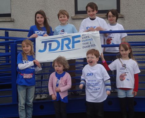 Some of the children in Shetland with Type 1 Diabetes and their siblings outside the Gilbertson games hall - Photo: Lynn Fraser