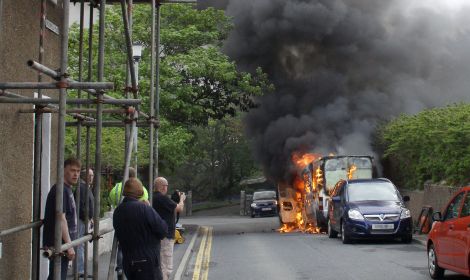 The blue Vauxhall car had to be moved to escape the flames.