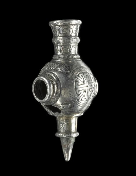 Silver pinhead, almost certainly from the Skaill hoard: elaborately ornamented pin-head without its shaft, from the large 'ball-type' penannular brooch, from the second half of the 9th century or first half of the 10th century. National Museums Scotland