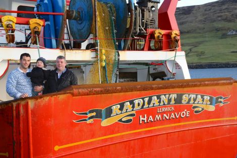 Skipper Victor Laurenson and crewman Marvin Inkster, with son Zac, on board the Radiant Star, one of the new vessels in the Shetland fleet supported by SIC money - Photo: SFPO
