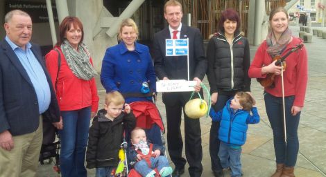 CURE supporters gather with Tavish Scott outside the Scottish Parliament building. Photo CURE