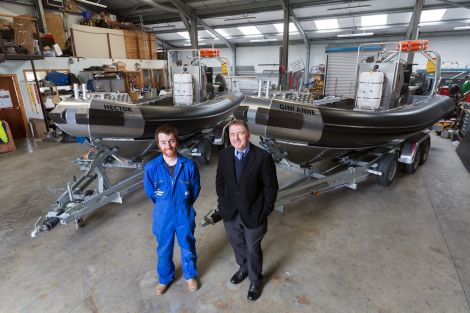 Pictured are Brydon Barclay of Unst Inshore Services (left) and HIE's David Priest.