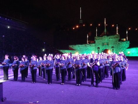 The fiddlers performing with Edinburgh Castle in the background. Photo: Kim Karam
