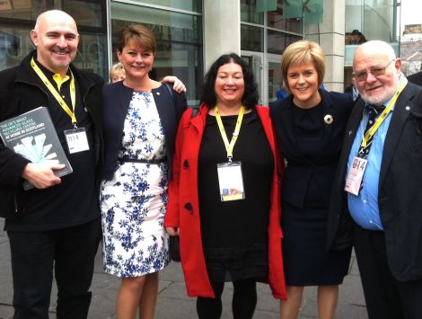 Shetland delegates at the SNP conference Neil Sutherland (left), Louise Giblin (centre) and Charlie Gallacher (right) with Leanne Wood, leader of Plaid Cymru (centre left) and new SNP leader Nicola Sturgeon (centre right).