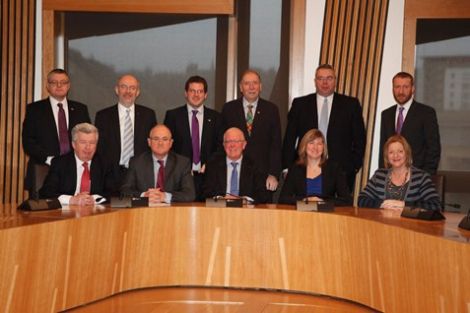 The Devolution (Further Powers) Committee with Tavish Scott MSP at the far right in the back row.
