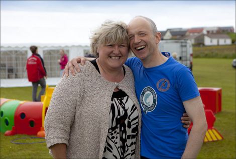 All smiles from fiddle tutor Eunice Henderson and Shetland football manager Niall Bristow. Photo: Dale Smith