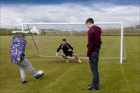 Shetland's number one Erik Peterson was put through his paces in a 'beat the goalie' competition.
