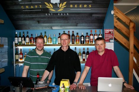 Beervana owners (l-r) Erik Burgess, William Sandison and Stuart Fox getting ready on launch day. Photo: Chris Cope/ShetNews