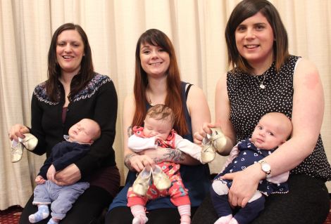 Mums Beth Smith with baby James, Jennifer Murray with Jada and Tanya Boxwell with Freija were presented with tiny golden boots to highlight how they collectively kicked flu into touch.
