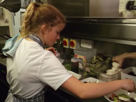Sandwick Junior High School pupil Jasmine Smith plates up starters in the busy kitchen at Hay’s Dock Cafe during last year’s "teens takeover".