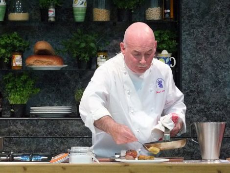Visiting Master Chef George McIvor dishes up his meal made of Shetland produce - Photo: Elizabeth Atia