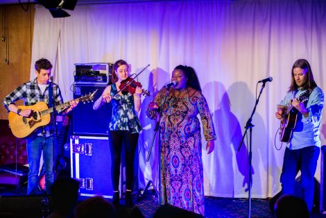 Dynamic frontwoman and vocalist Yola Carter and her trio, joined by classy local fiddler Kirsten Hendry, at the Lerwick Legion on Friday night. Photo: Steven Johnson.