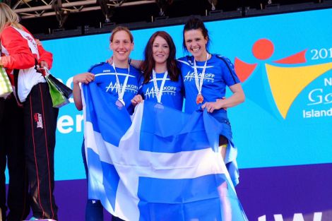 All smiles from bronze medal-winning triathlon trio Lynsey Henderson, Shelley Humphray and Wendy Hatrick. Photo: Shetland Island Games Association.