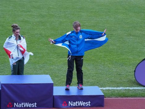 Faye Cox on the podium after winning bronze in the 200m women’s final. Photo: Maurice Staples