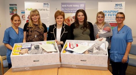 First Minister Nicola Sturgeon delivering Scotland's first baby boxes earlier this year. Photo: Scottish Government.
