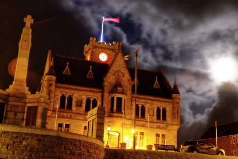 The Town Hall in Lerwick saw its clockface turn red on Thursday ahead of World AIDS Day today (1 December). Photo: Shetland Islands Council