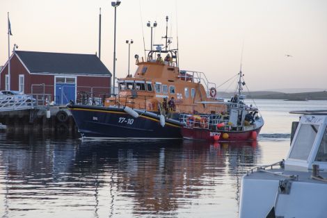 The Lerwick lifeboat taking the Dawn Mist II into Lerwick on Thursday evening. Photo: David Spence