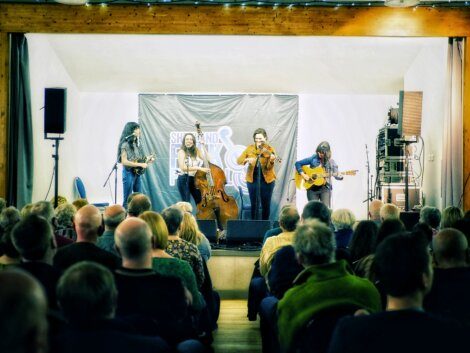 Della Mae rounding off a splendid night of music at Cunningsburgh Hall. Photo: Lieve Boussauw.